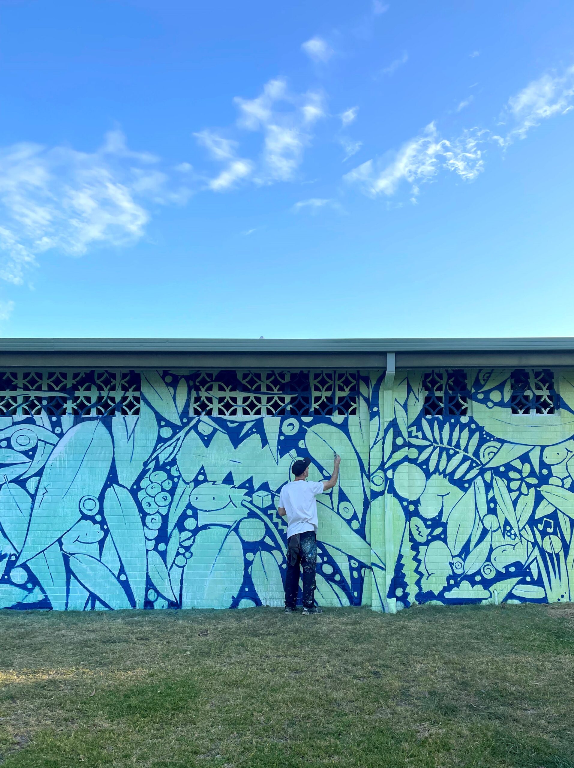 Artist painting mural