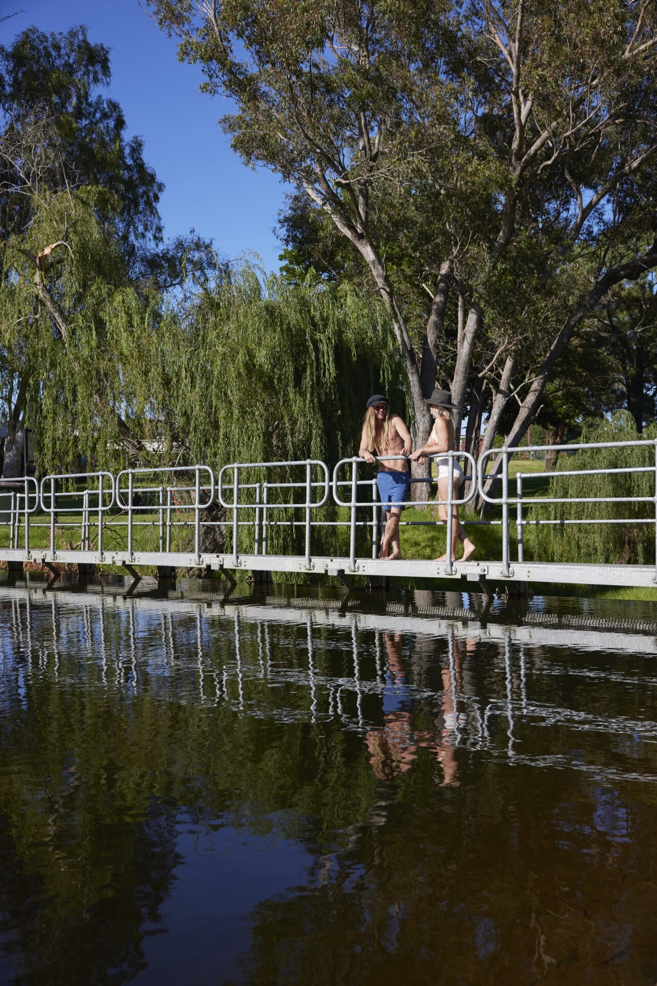 Brunswick-River-Pool-Footbridge-with-Couple-2-Credit-Bianca-Turri-1281x1920.jpg
