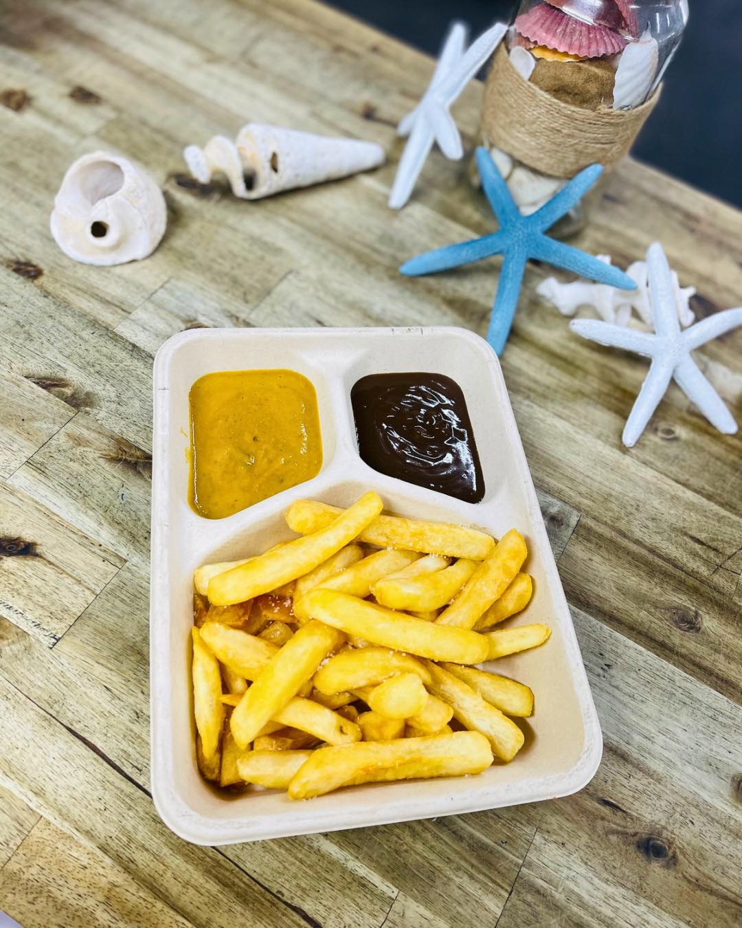 Harvey-Fish-and-Chips-Chips-with-homemade-curry-sauce-and-gravy.jpg