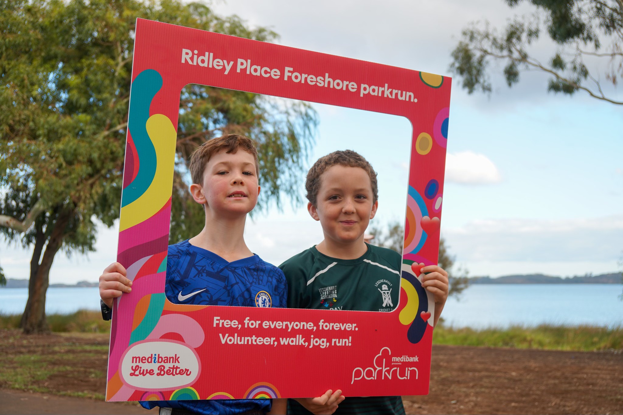 Image of two boys smiling after completing the Ridley Place Foreshore Parkrun