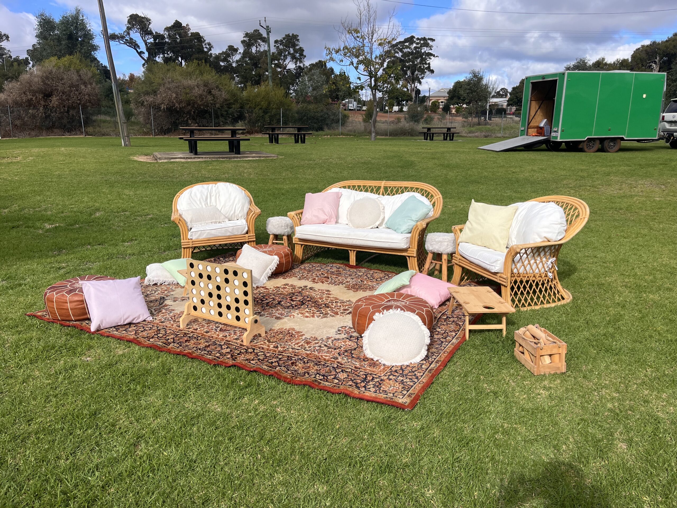 Image of outdoor seating with pastel coloured cushions for a colour