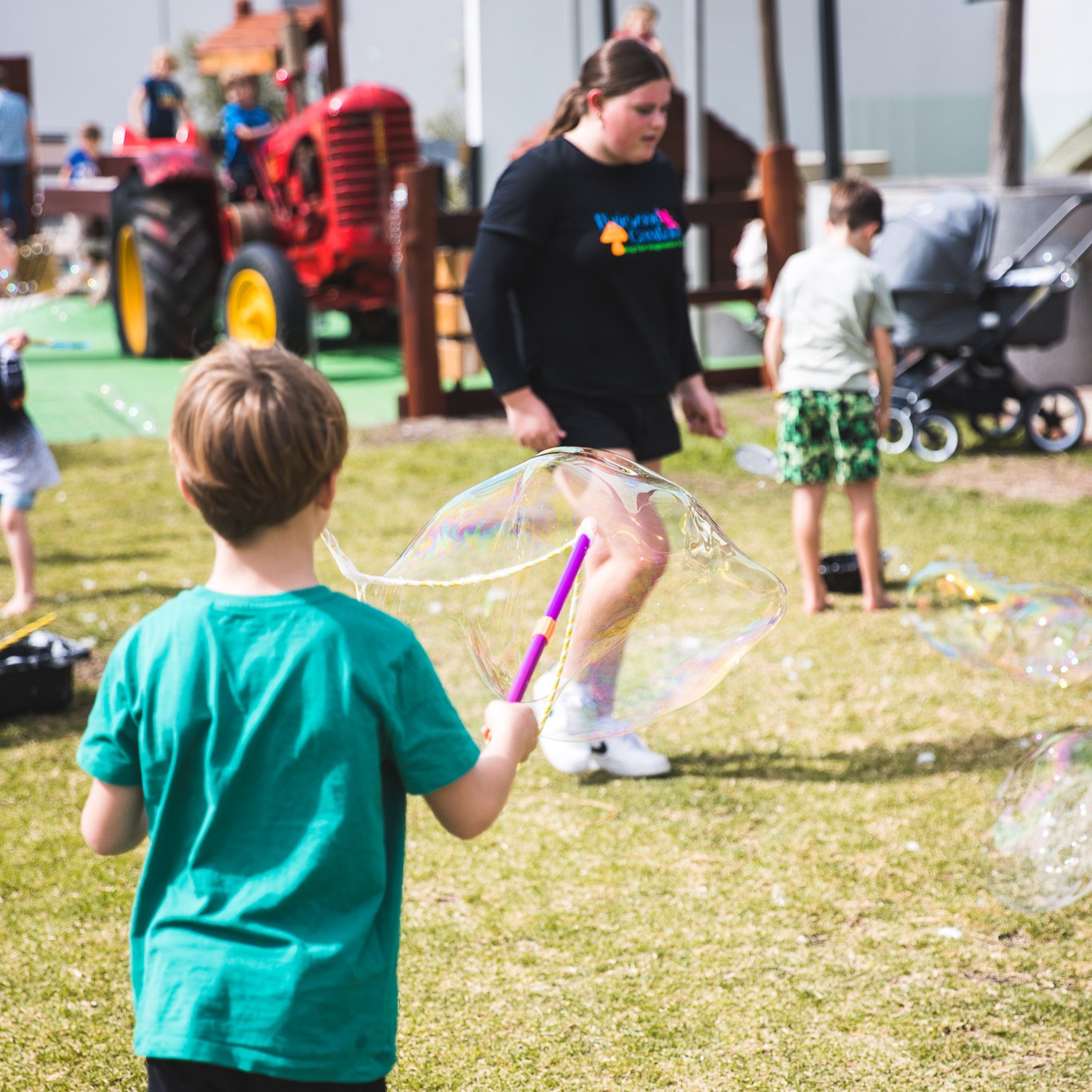 Image of kids blowing large bubbles at the Treendale Farm Hotel