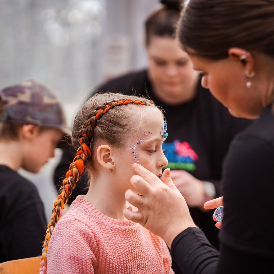 Image of a girl getting her face painted