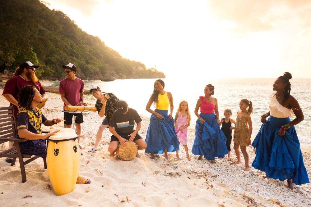 Image of the Music in the Gardens Salama Island Rhapsodies team on the beach