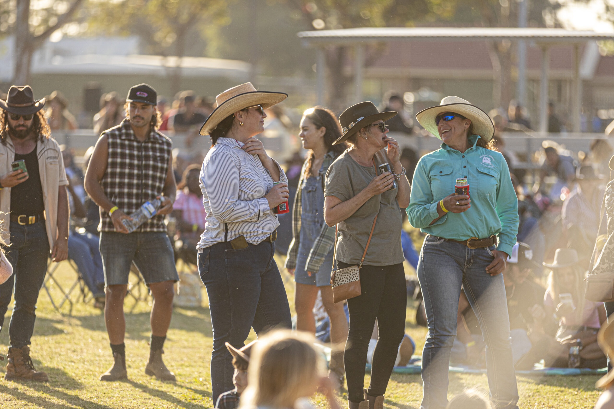 Image of people dressed up in cowboy/girl themed clothing.