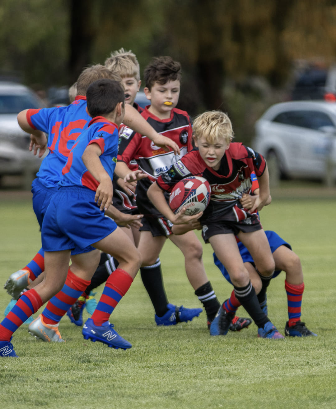 Image of kids playing Rugby