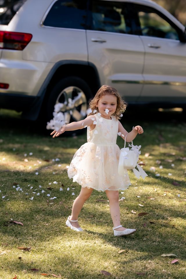 Vallee-Creative-Wedding-Child-scattering-petals.jpg
