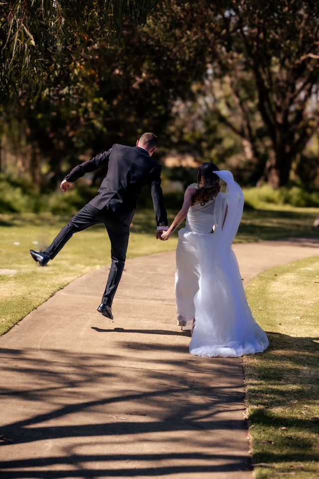 Vallee-Creative-Wedding-Groom-jumping.jpg
